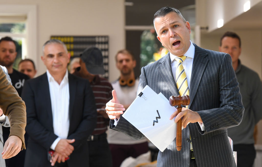 Auctioneer Clarence White in action at the auction of  8 Bishop Street Petersham. Photo: Peter Rae