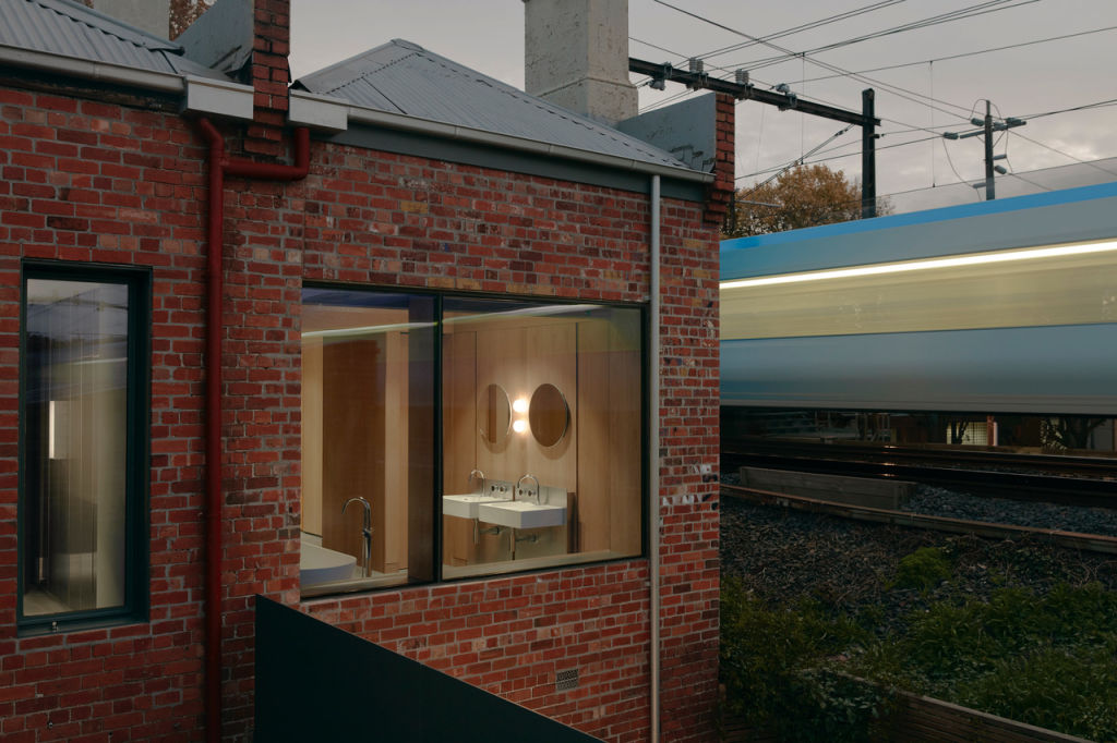 The clients insisted on a big window in what must now be the least discreet bathroom in Melbourne. Photo: Tom Ross