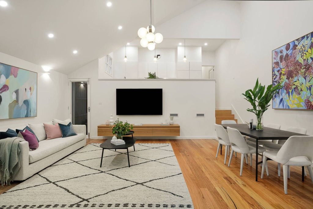 The vaulted ceiling in the living space and the kitchen beyond at 97 Eglington Street, Kew.