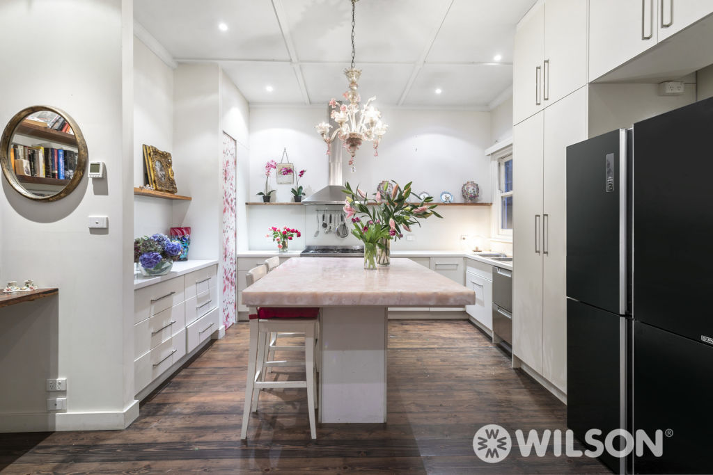 Alannah Hill added a pink onyx benchtop to her kitchen breakfast bar.