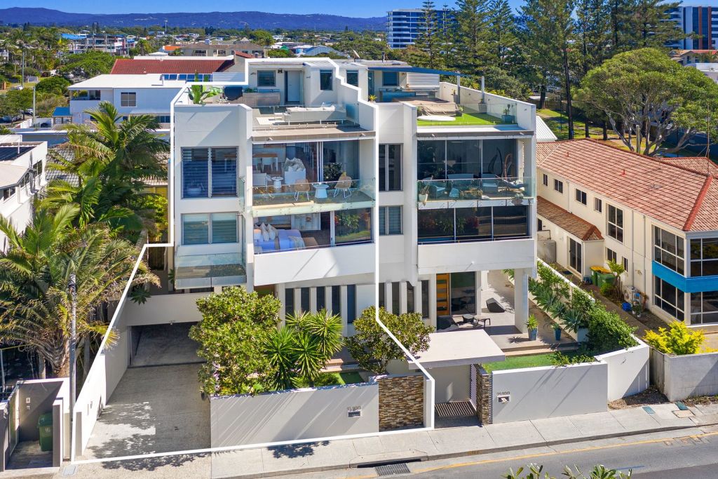 Grant Hackett plans to buy a larger property in Melbourne after selling his Gold Coast holiday home this week.