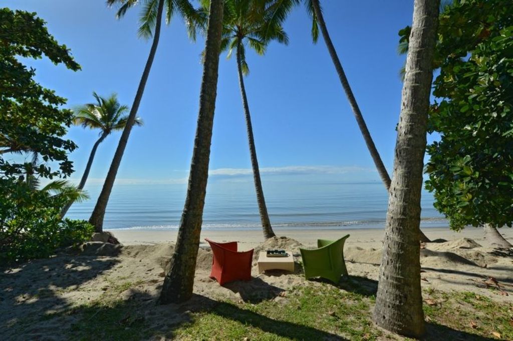 Caroline Yarr in Port Douglas says a $5 million property can get buyers their own private beach, with her current listing 14 Rankin Street Newell having its own beachfront. Photo: Supplied