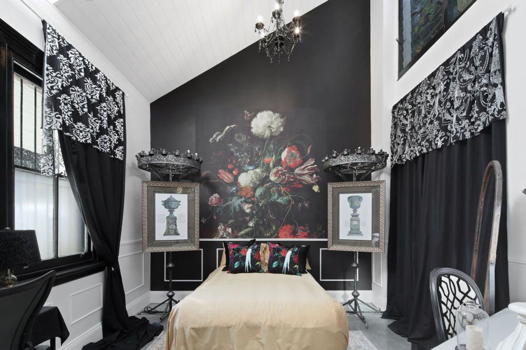 Bold floral wallpaper, whimsical murals and Italian botanical tiling can be be found in the three main bedrooms. Photo: Supplied