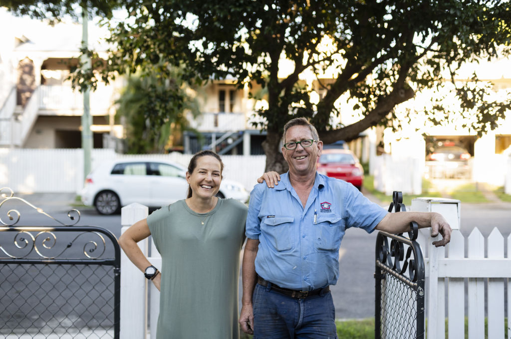 Laura Hattin and her dad Kevin Hattin worked hard to turn Brisbane's 'worst house' into the quintessential Queenslander cottage. Photo: Marc Pricop