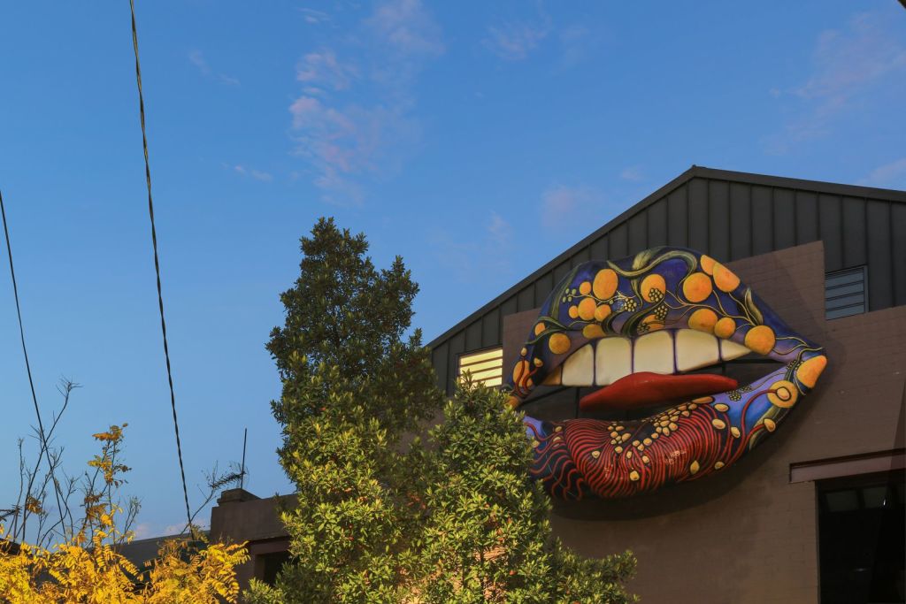 The iconic lips were recently refabricated and then repainted by artist Rachel Szalay.