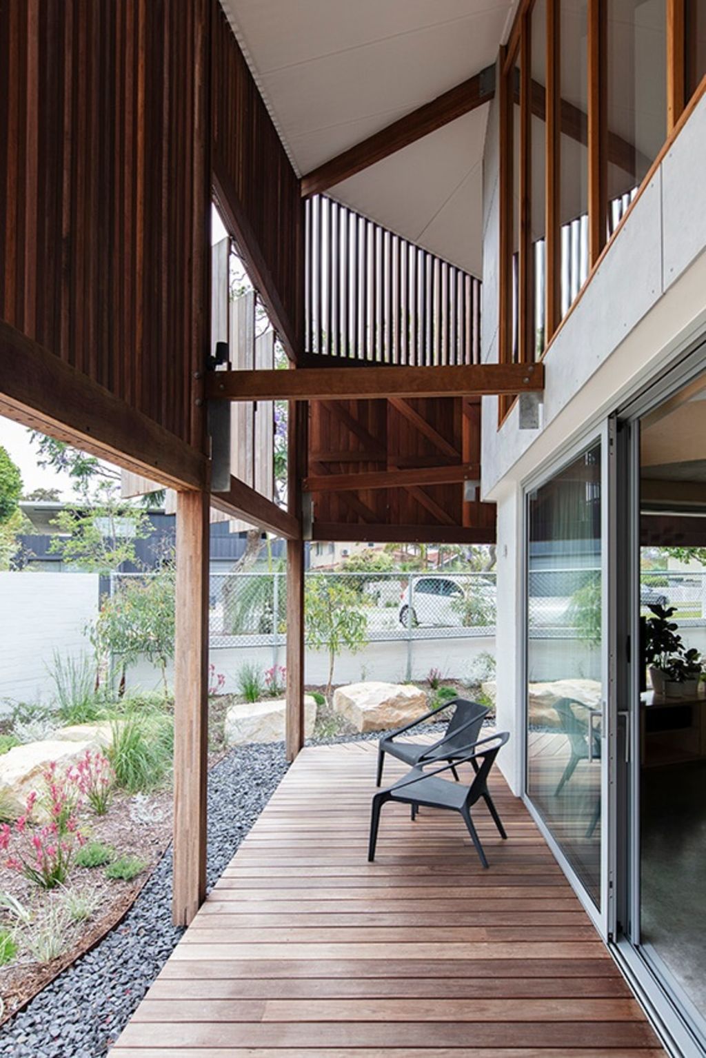 The climate and privacy screen on the Applecross house re-emphasises the importance of a useful verandah in Australia. Photo: Bo Wong