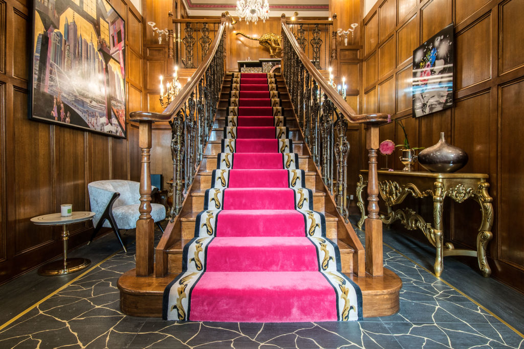 The original staircase, imported from a chateau in Europe, survived the extravagant renovation carried out during Melbourne's lockdown last year.