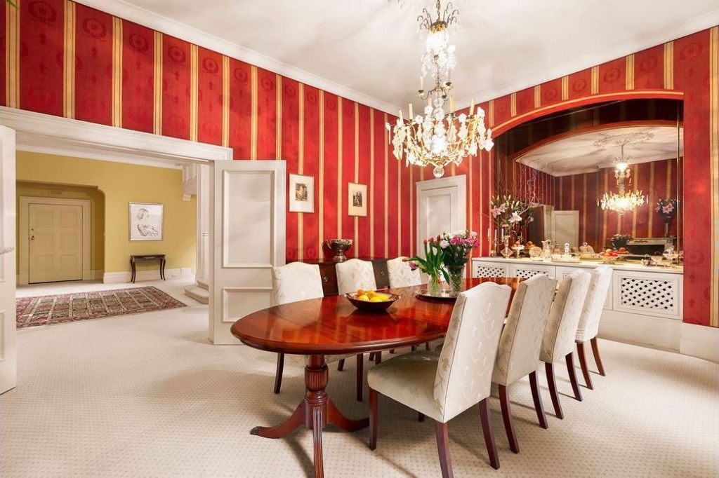 The $10,000 a week mansion includes a private dining room dripping with chandeliers.