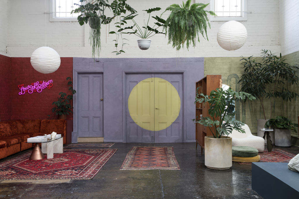 The creative duo's home is an explosion and colour and art. Photo: Charlie Kinross