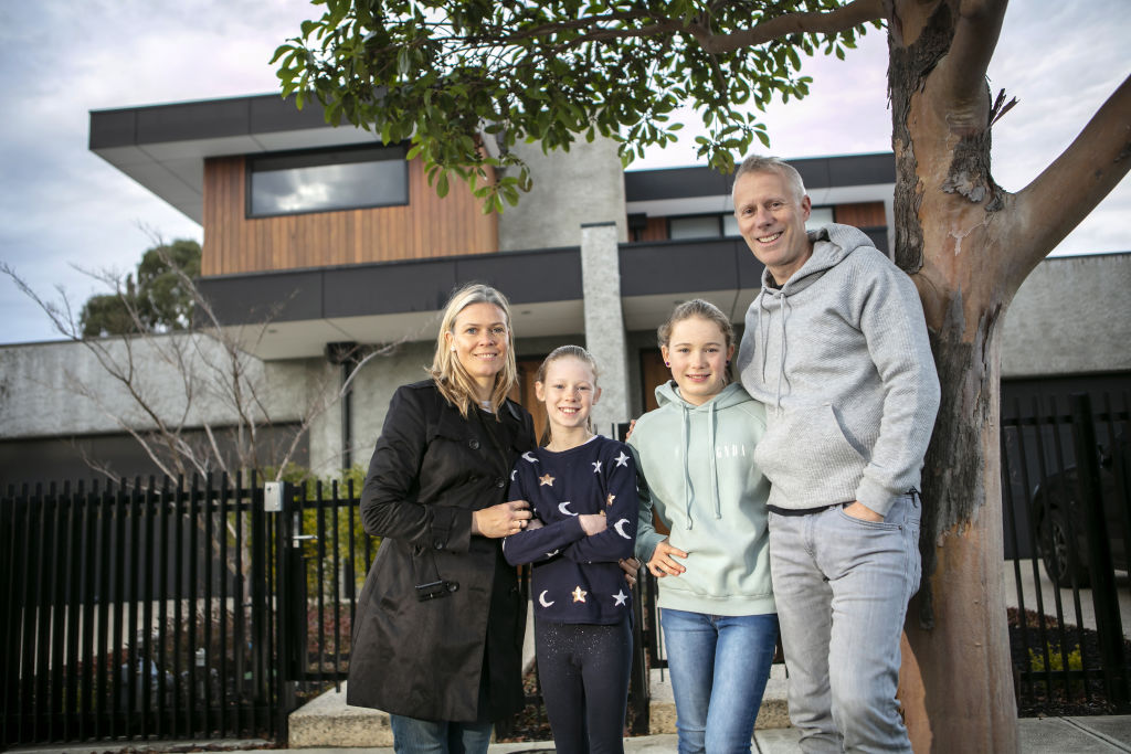Jon and Jette Doherty with daughters Helena and Isabella at their new home. Photo: Stephen McKenzie