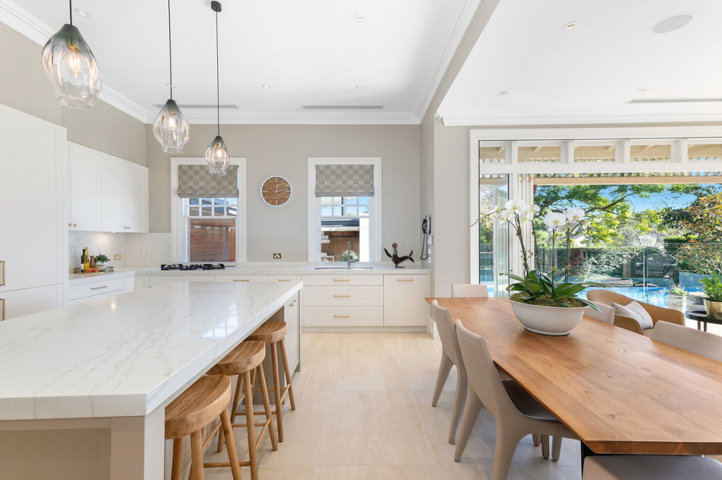 The kitchen comes with the latest Miele appliances and is well connected to the living spaces. Photo: Supplied
