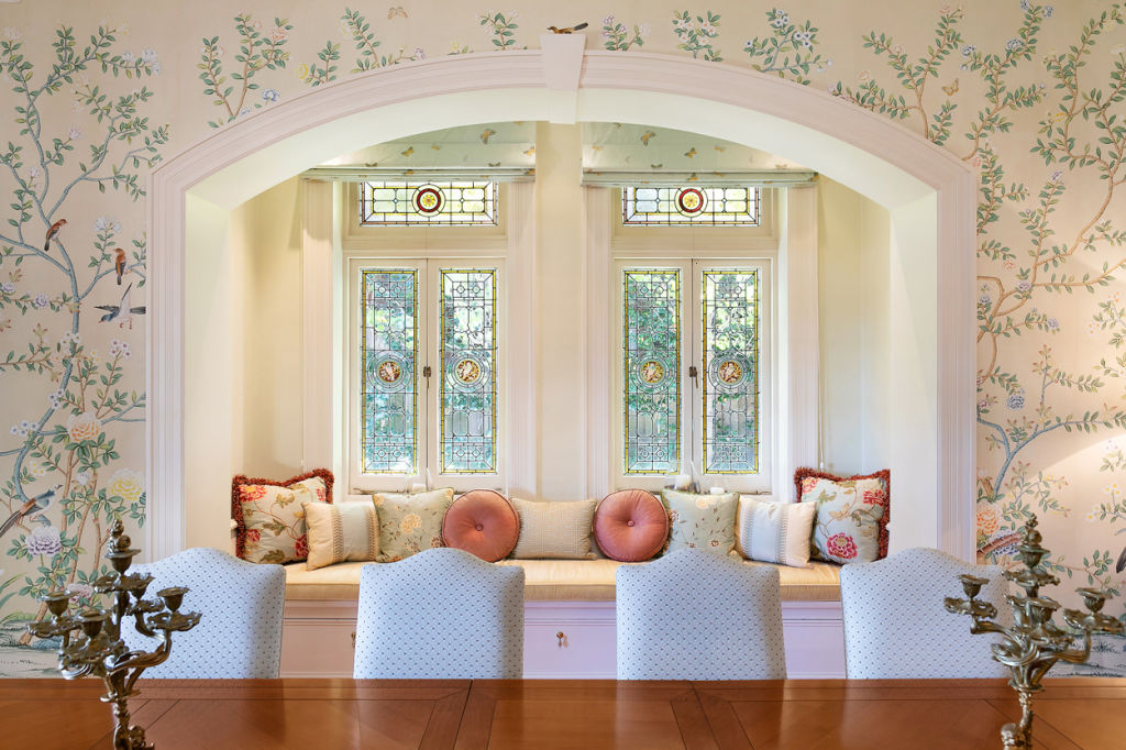 The home features delicate finishes such as stained glass windows and imported wallpaper. Photo: Supplied