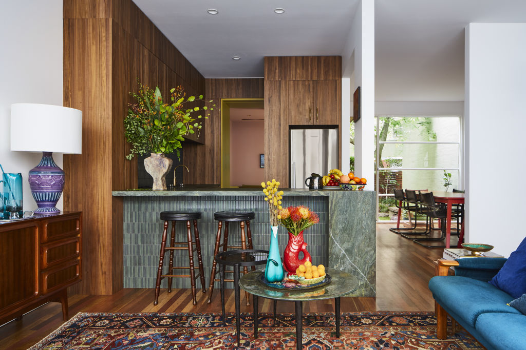 The breakfast bench acts as a focal point and connects to an open living and dining space. Photo: Armelle Habib