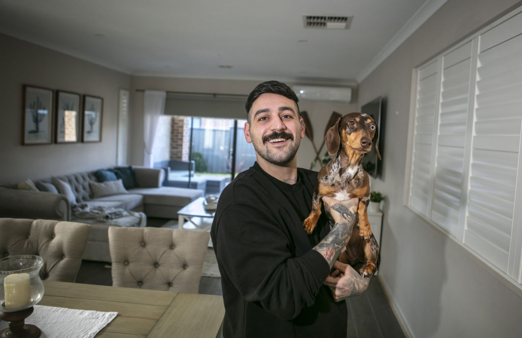 Adam Lamanna, with his dog Twix, recently held off on pre-auction offers, went to auction and sold his property under the hammer for considerably more money. Photo: Stephen McKenzie