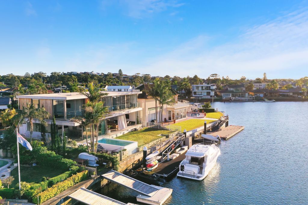 With water views, a heated pool and plenty of luxury features, this home in a quiet cul-de-sac is very convenient for families. Photo: Supplied