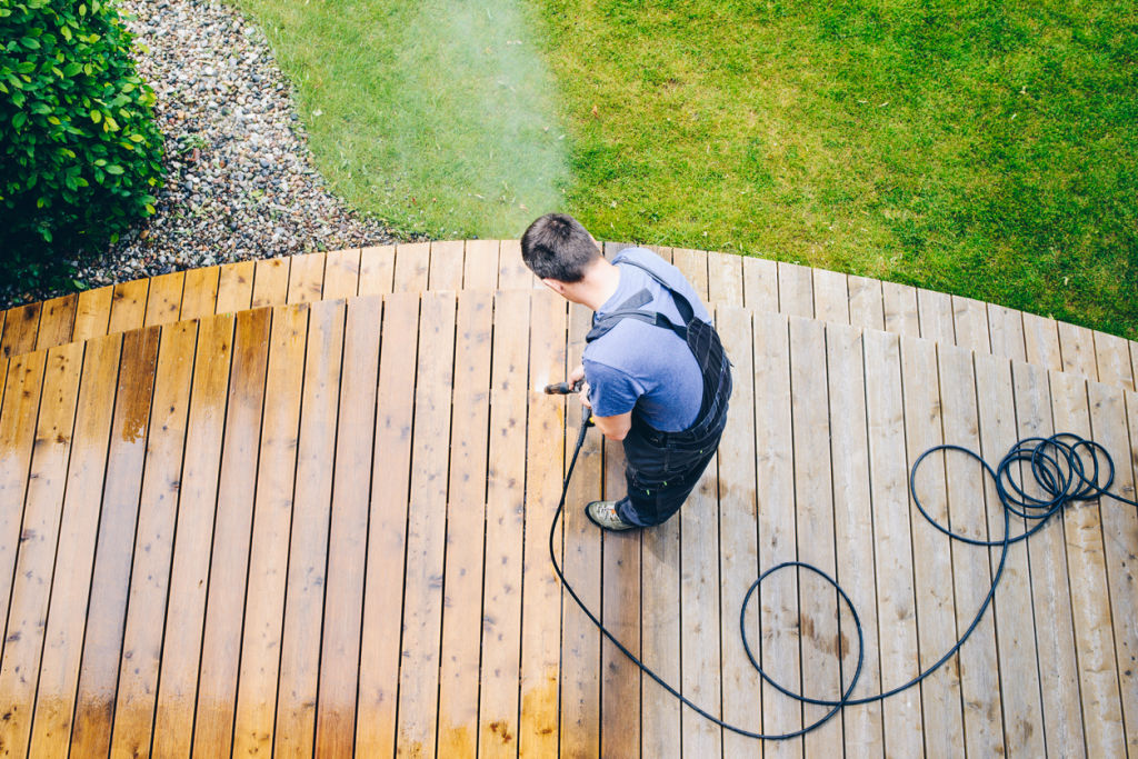 A deep clean of decking and outdoor furniture is required a couple of times a year. Photo: iStock