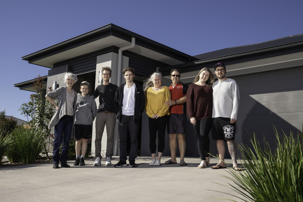 Dorothy Day, Malachy Day, Aaron Day, Carter Day, Michelle Hadley, Garth Hadley, Tegan Hadley and Connor Chowns all call the Greenbank development home. Photo: Paul A. Broben