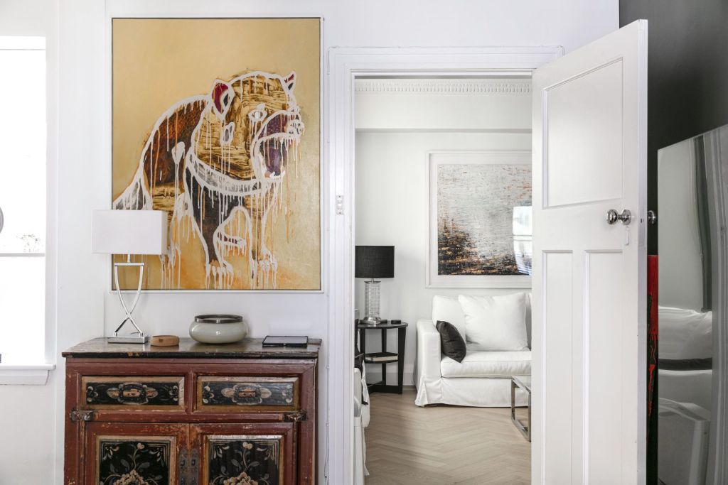 While some landlords may allow tenants to hang art using hooks, removable picture hanging strips allow tenants to hang art without damaging walls.