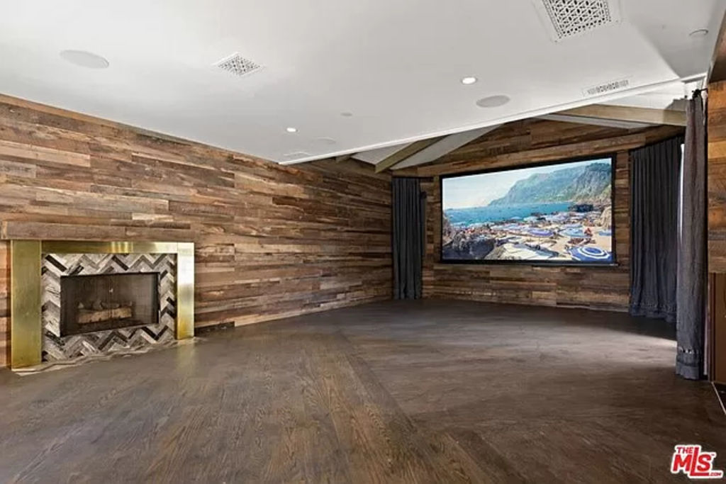 The three-storey home has a cinema room and a separate artist's studio. Photo: Zillow