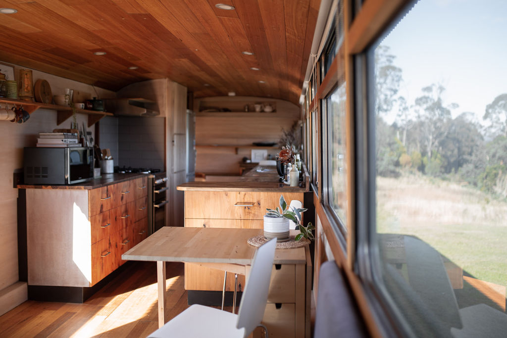 Aside from the electrical work, Nick did almost everything 'right down to the fronts on the drawers in the kitchen, the couches and the lift-up king bed up the back of the bus'.  Photo: Lauren McKinnon