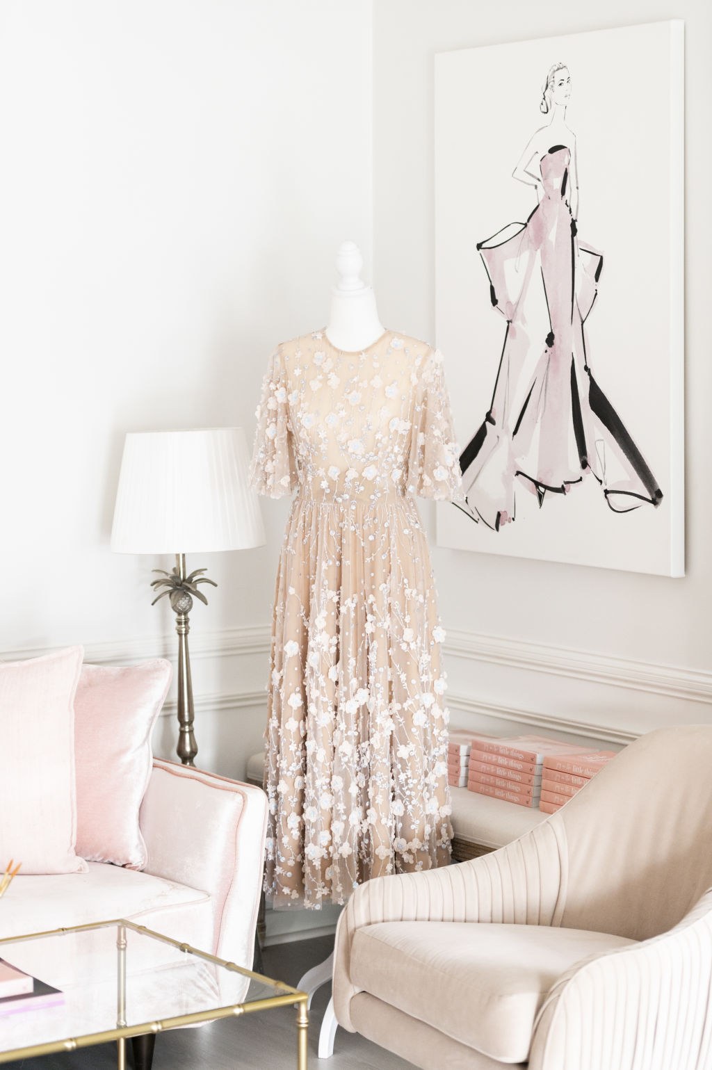 A handmade couture gown by George Wu sits elegantly on a mannequin in the studio Photo: Marc Pricop