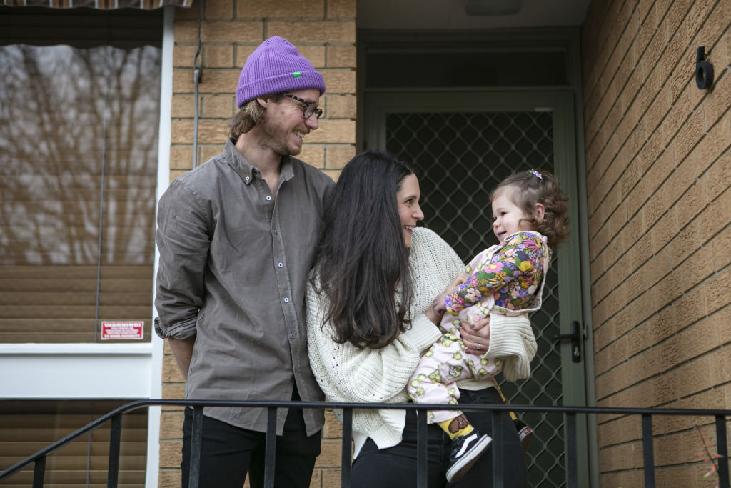 Mia Jardon and Brent White with their daughter Florence are looking to buy a fixer upper. Photo: Stephen McKenzie
