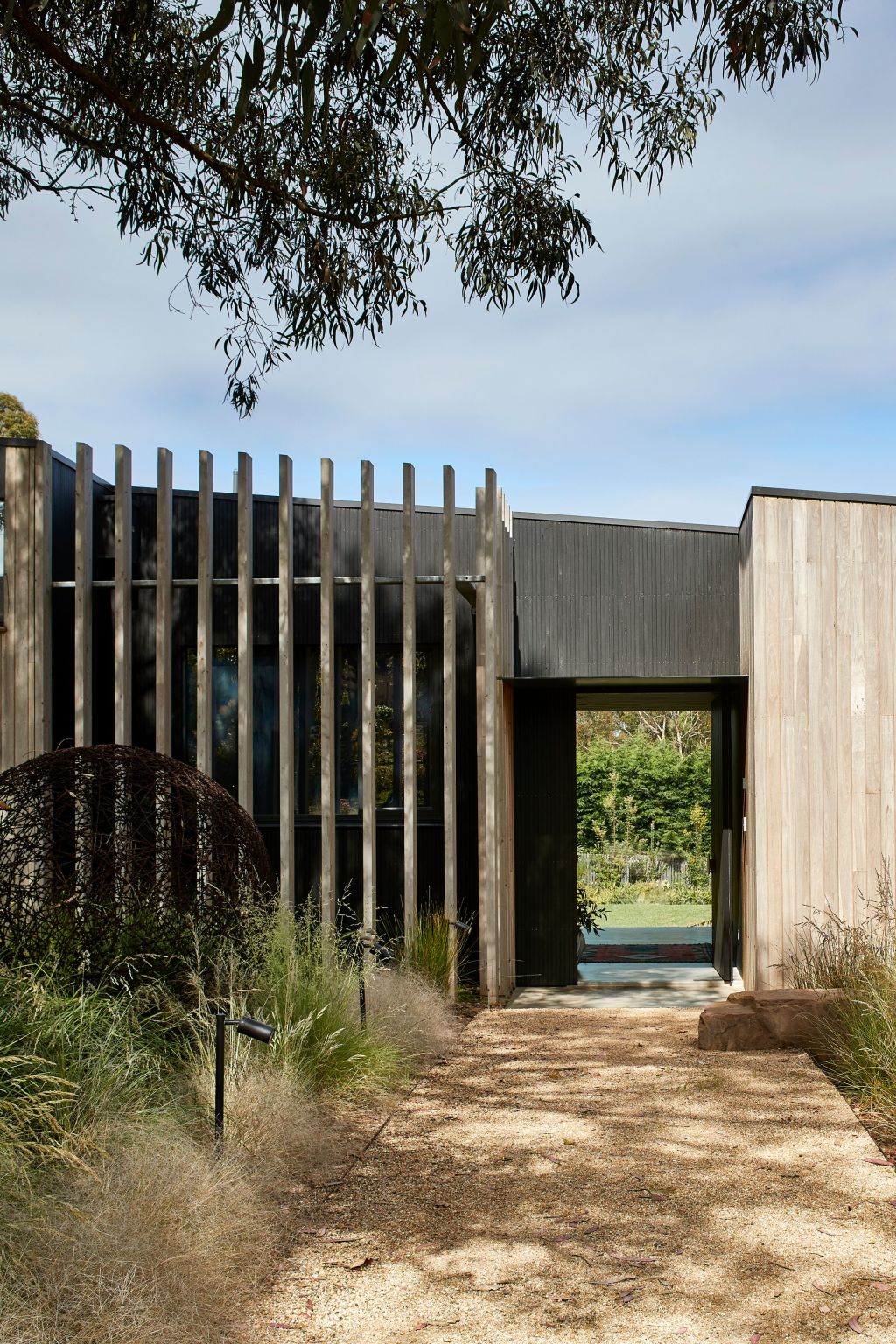 The entry is designated by darker stained wood. Photo: Shannon McGrath