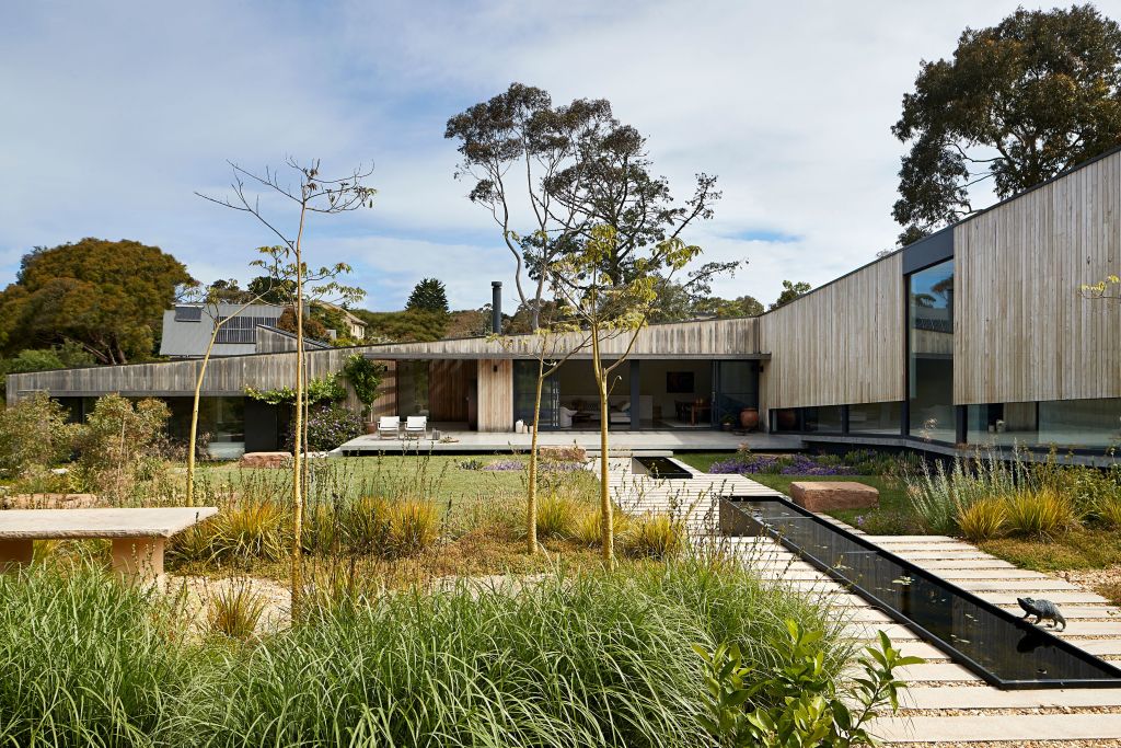 A house built to trace descending land and a beautiful gardenscape. Photo: Shannon McGrath