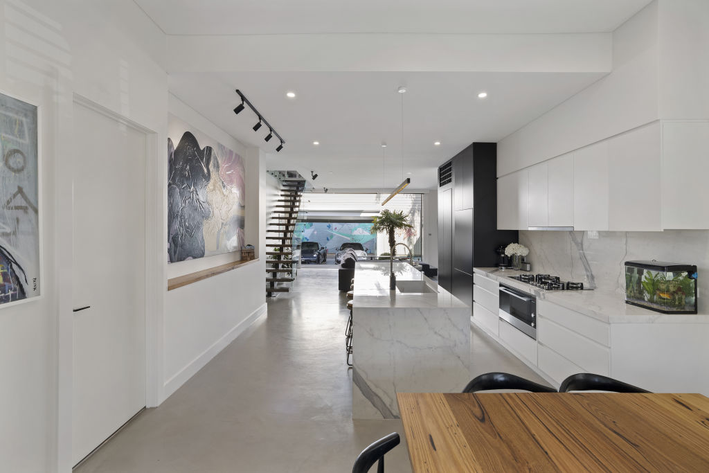 The modern details throughout the kitchen, living and dining spaces.  Photo: Whitefox