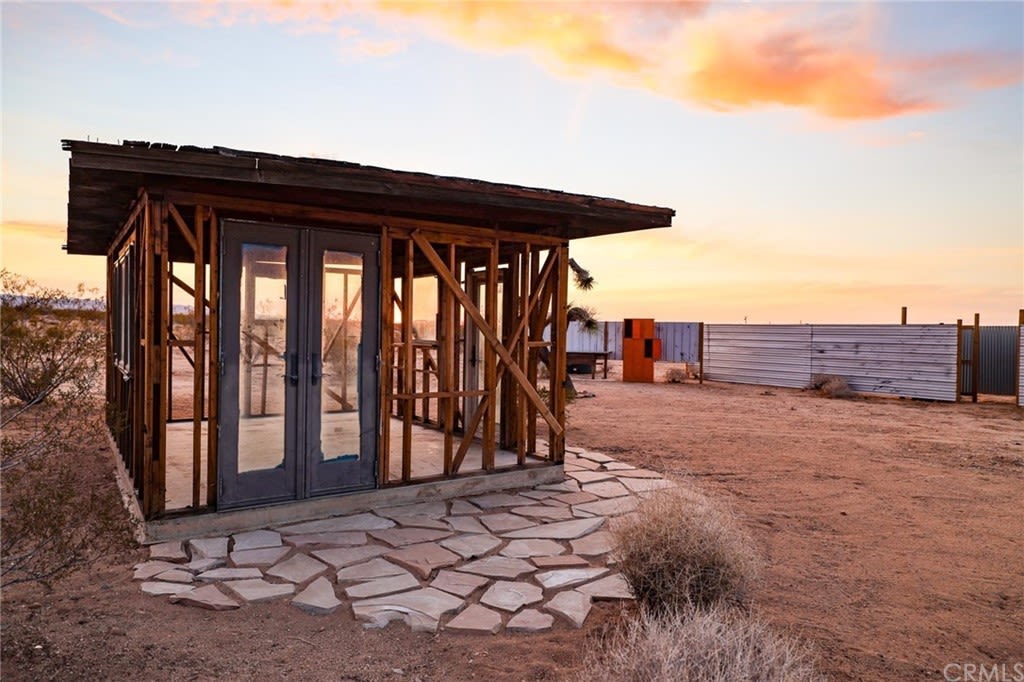 House in the middle of the desert with no walls or utilities listed for $95,000