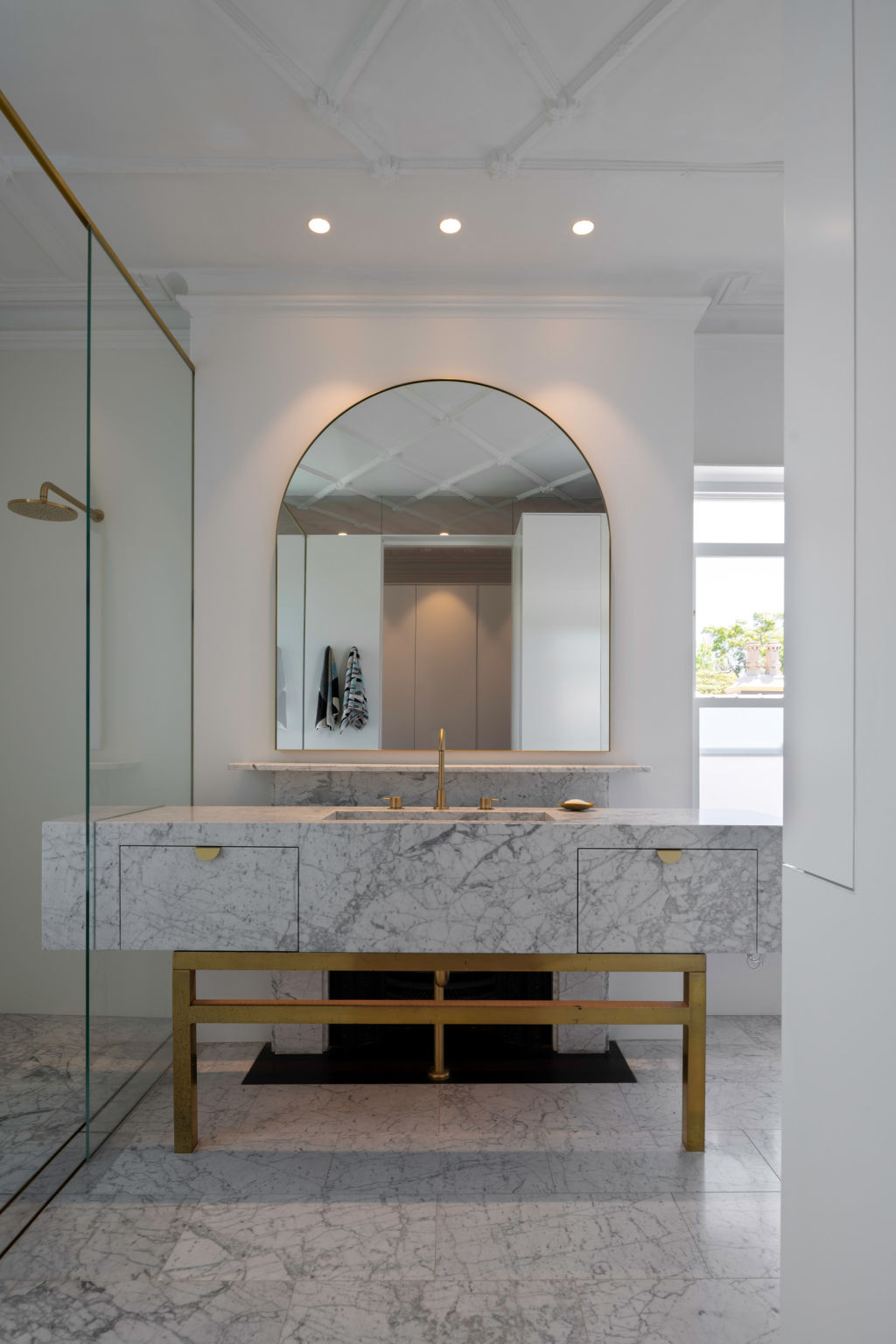 The original fireplace is the back element of the en suite vanity. Photo: Willem Rethmeier