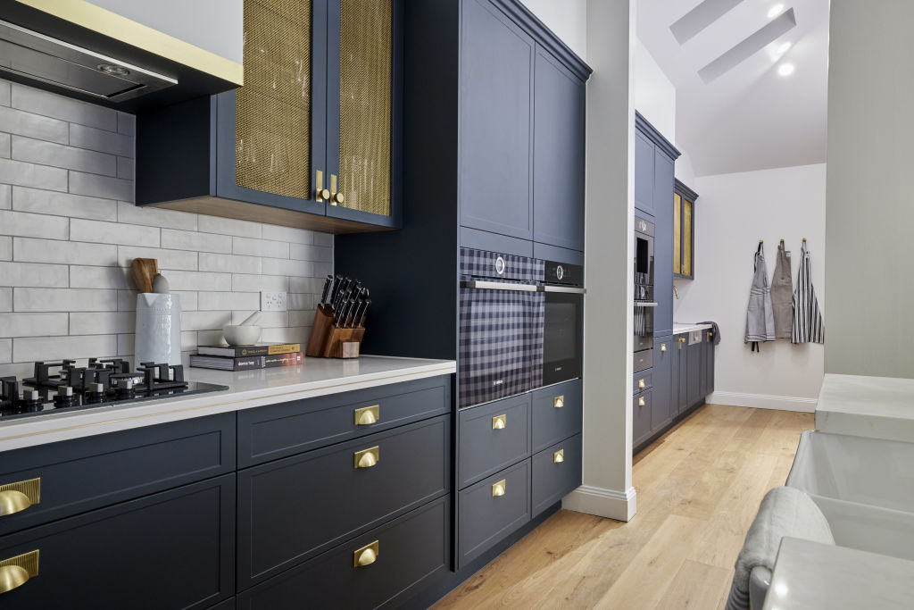 Kirsty and Jesse's navy cabinetry with brass hardware stunned with its beauty. Photo: Channel Nine