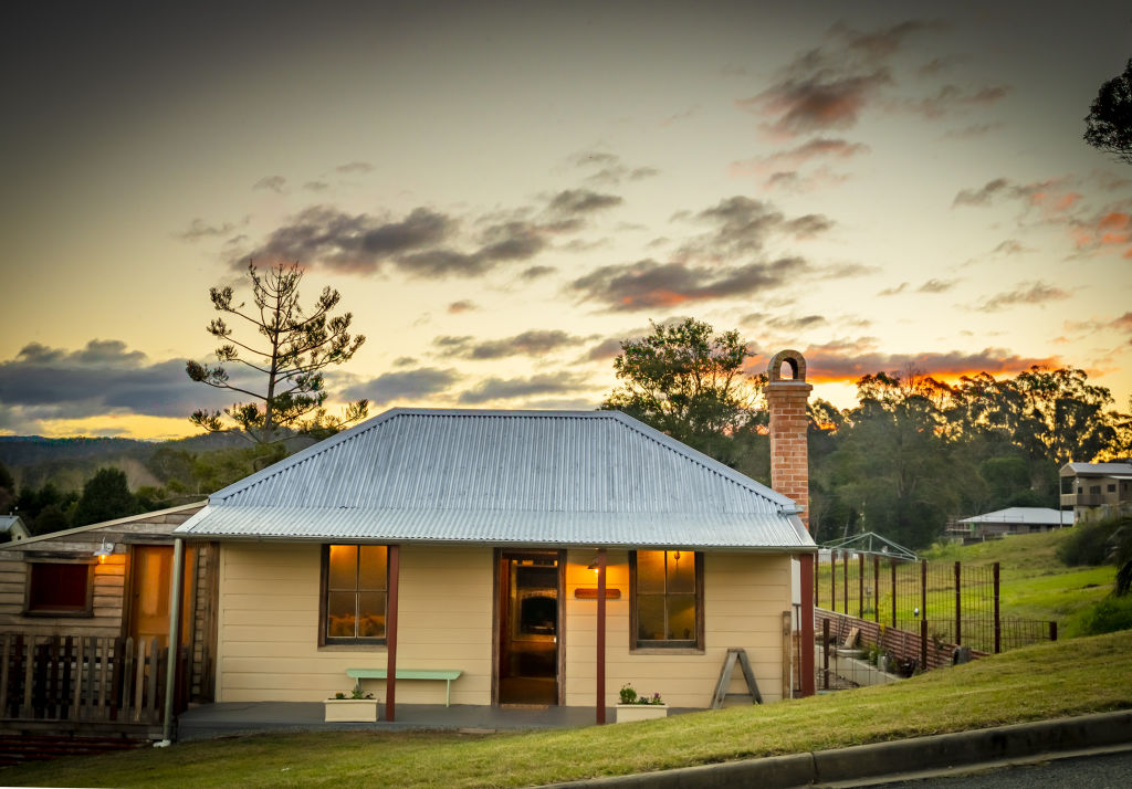 Restorations often take more time and money than expected, as with the transformation of Baddeley Cottage in Pambula, NSW. Photo: ABC