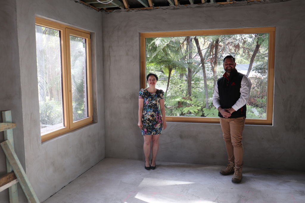 Davina Rooney, pictured with her builder Trent, reimagined her 1940s style Roseville home and has been transforming it into a beacon of sustainable living. Photo: Supplied
