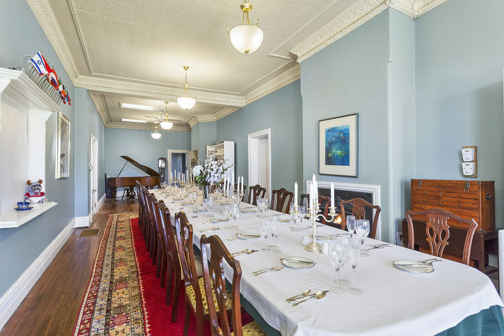 The formal dining room has space to seat 50 people.