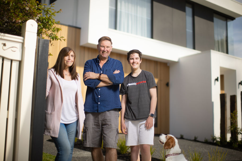 The Age, Saturday Domain.. Festive season real estate. Trevor Wilson, his wife Liza, son Jack and dog Harvey with their Sandringham property they are selling.Pic Simon Schluter. 8 October 2021