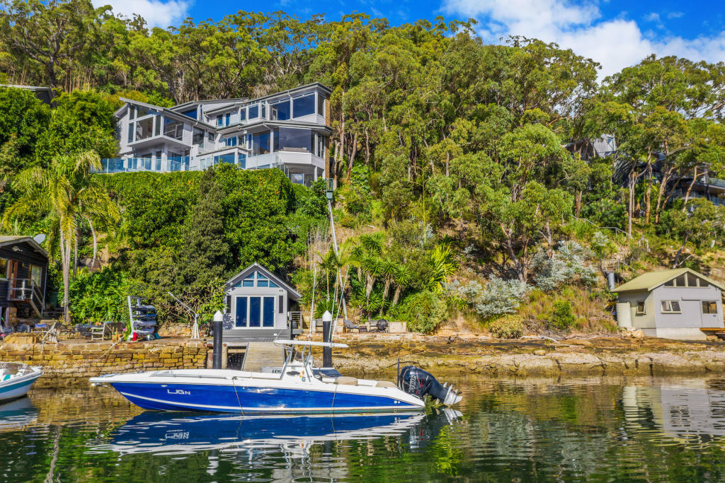 The 1400-square-metre property comes complete with a self-contained boathouse.