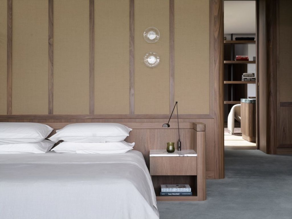 Akin Atelier and cabinet maker JP Finsbury contrived the rattan and walnut cabinetry. Photo: Anson Smart