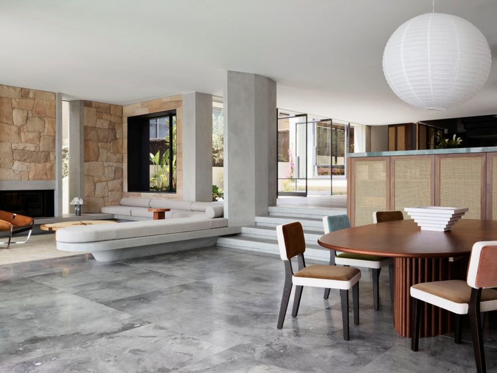 An exemplary sequence of craftsmanship focused on a floating concrete couch base. Photo: Anson Smart