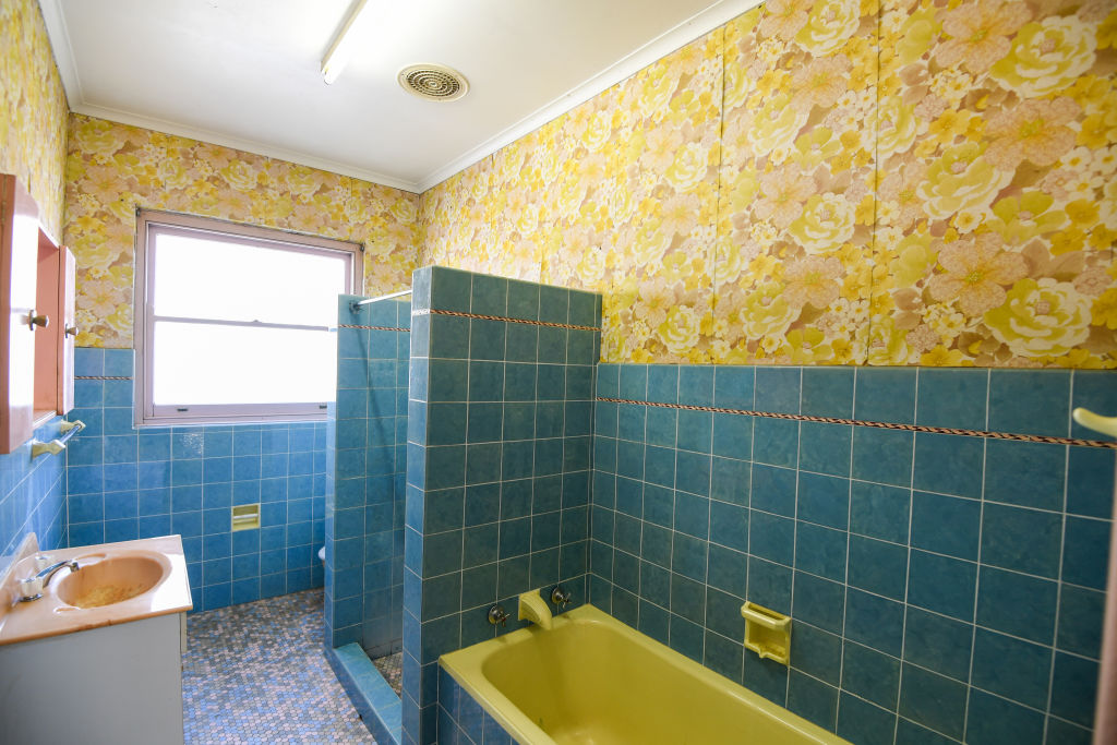 The run-down home had original features throughout the property including the bathroom. Photo: Peter Rae
