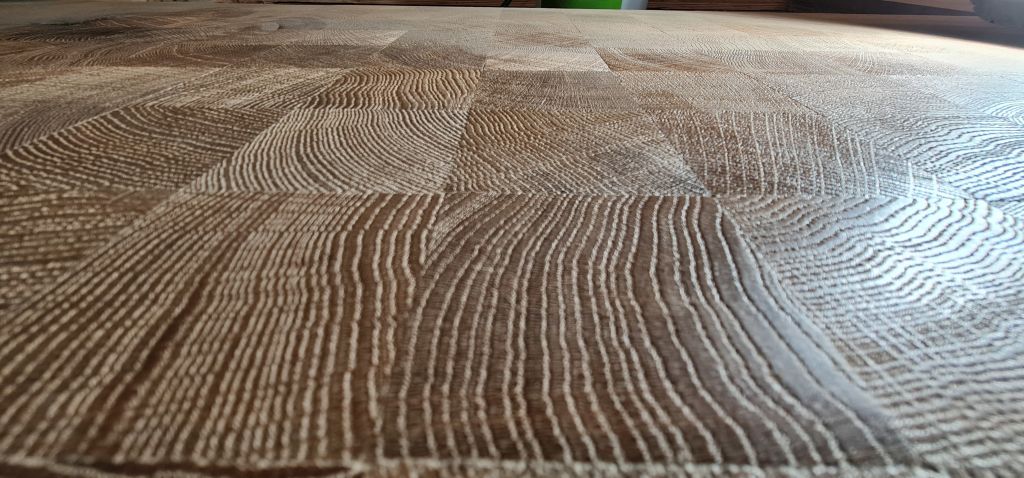 Endgrain parquetry from 300 year old oak trees applied in a Hong Kong Gallery.
