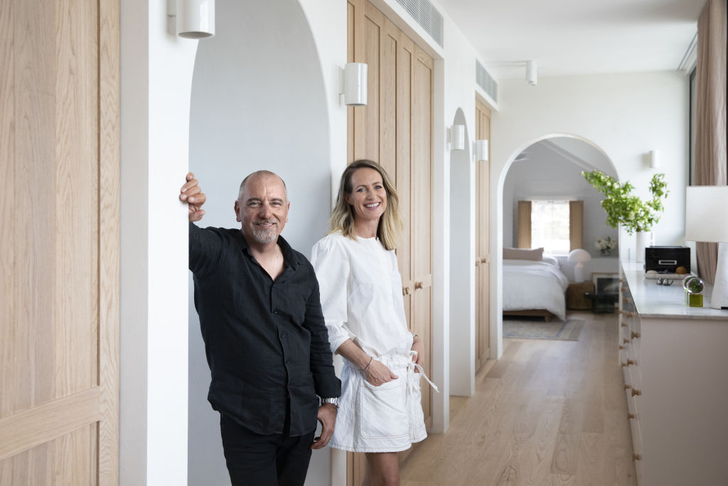 The Block's co-creator Julian Cress with his wife Sarah Armstrong in their newly renovated main bedroom suite. Photo: Charlie Kinross