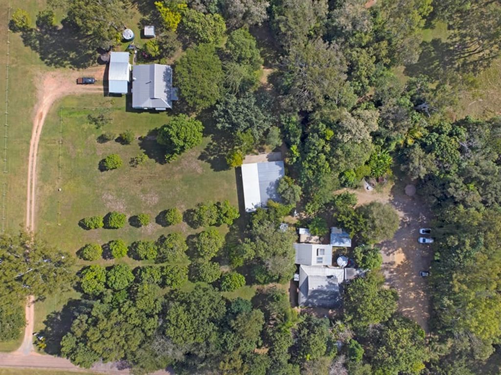 For sale is a business and dwellling and land in the tropics.