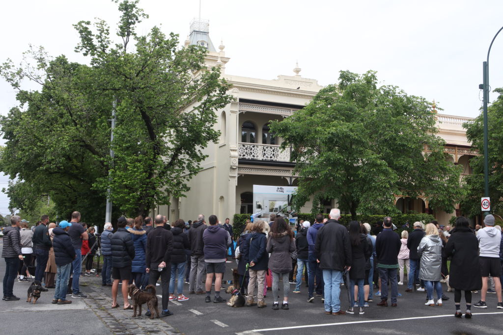 A crowd of more than 200 attended the auction of 53 St Vincent Place, Albert Park. Photo: Stephen McKenzie