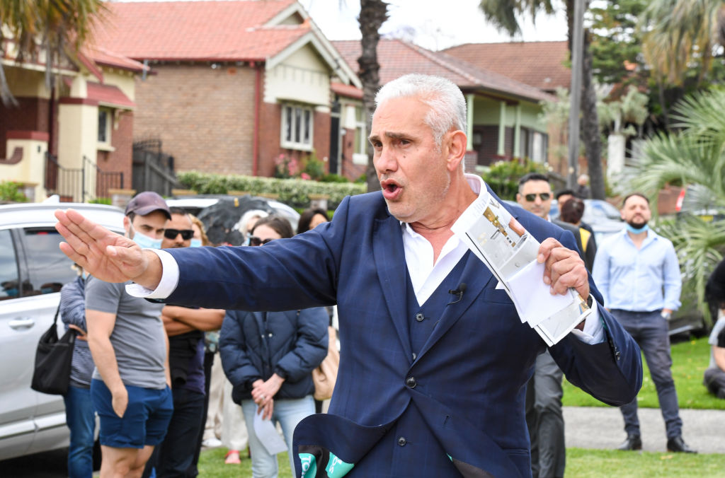 Auctioneer Tom Panos in full flight during a Croydon Park auction. Photo: Peter Rae