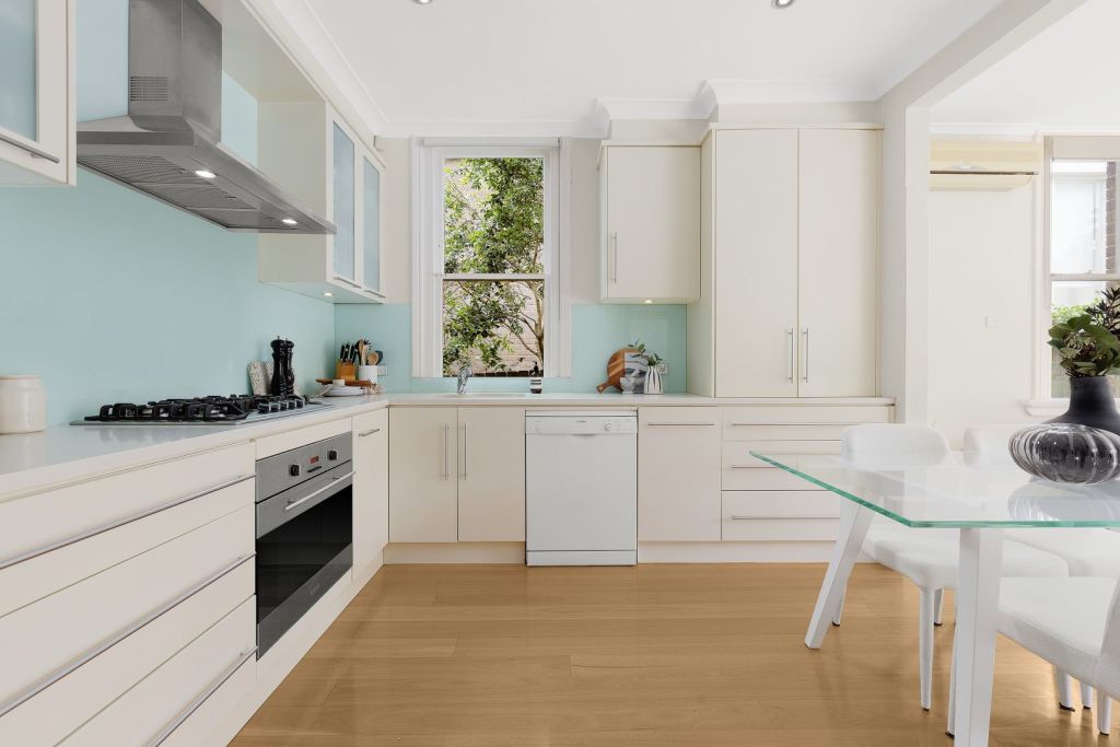 The kitchen includes a five-burner gas cooktop and stone benchtops. Photo: Supplied