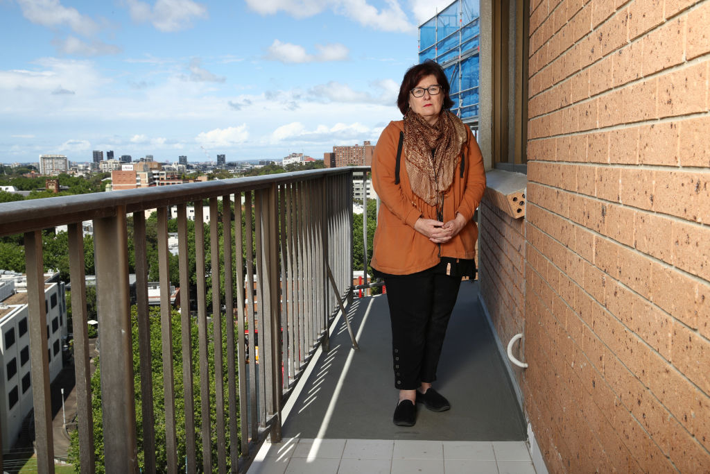Jo Rosenthal on the balcony of her Surry Hills penthouse. Photo: Supplied.