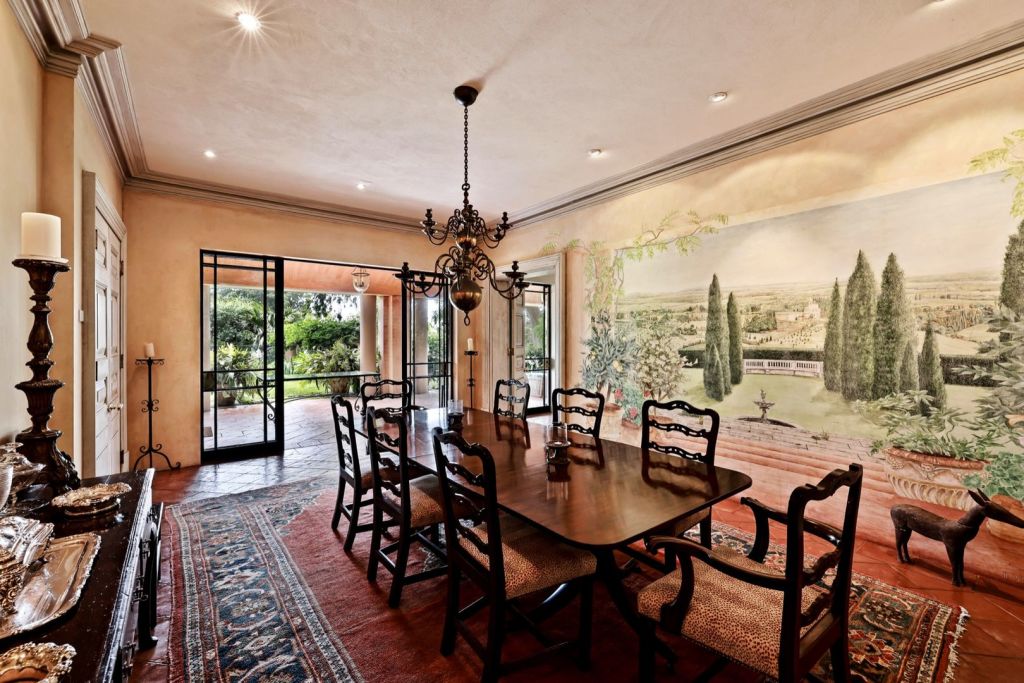 The formal dining room features a full-sized mural.