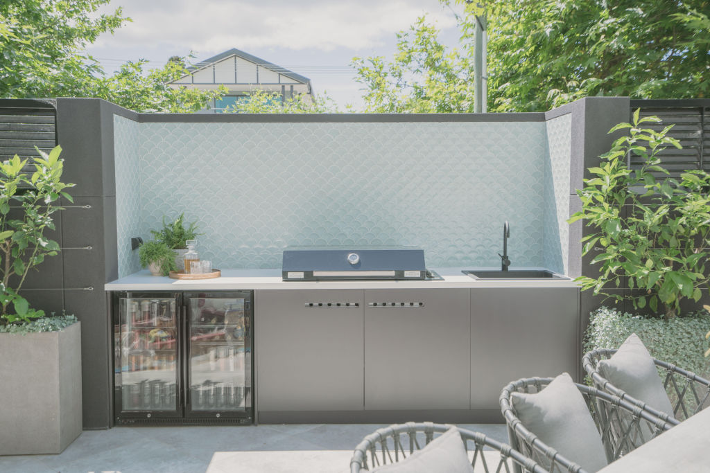 A crisp, contemporary outdoor kitchen by Charlie Albone's Inspired Exteriors. Photo: James Martino