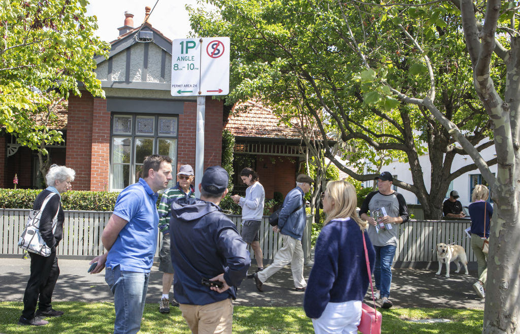 A large crowd looked on as 76 Armstrong Street, Middle Park, sold for $9.8 million. Photo: Stephen McKenzie